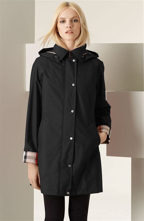 burberry raincoat woman's|wearing Burberry rain boots.